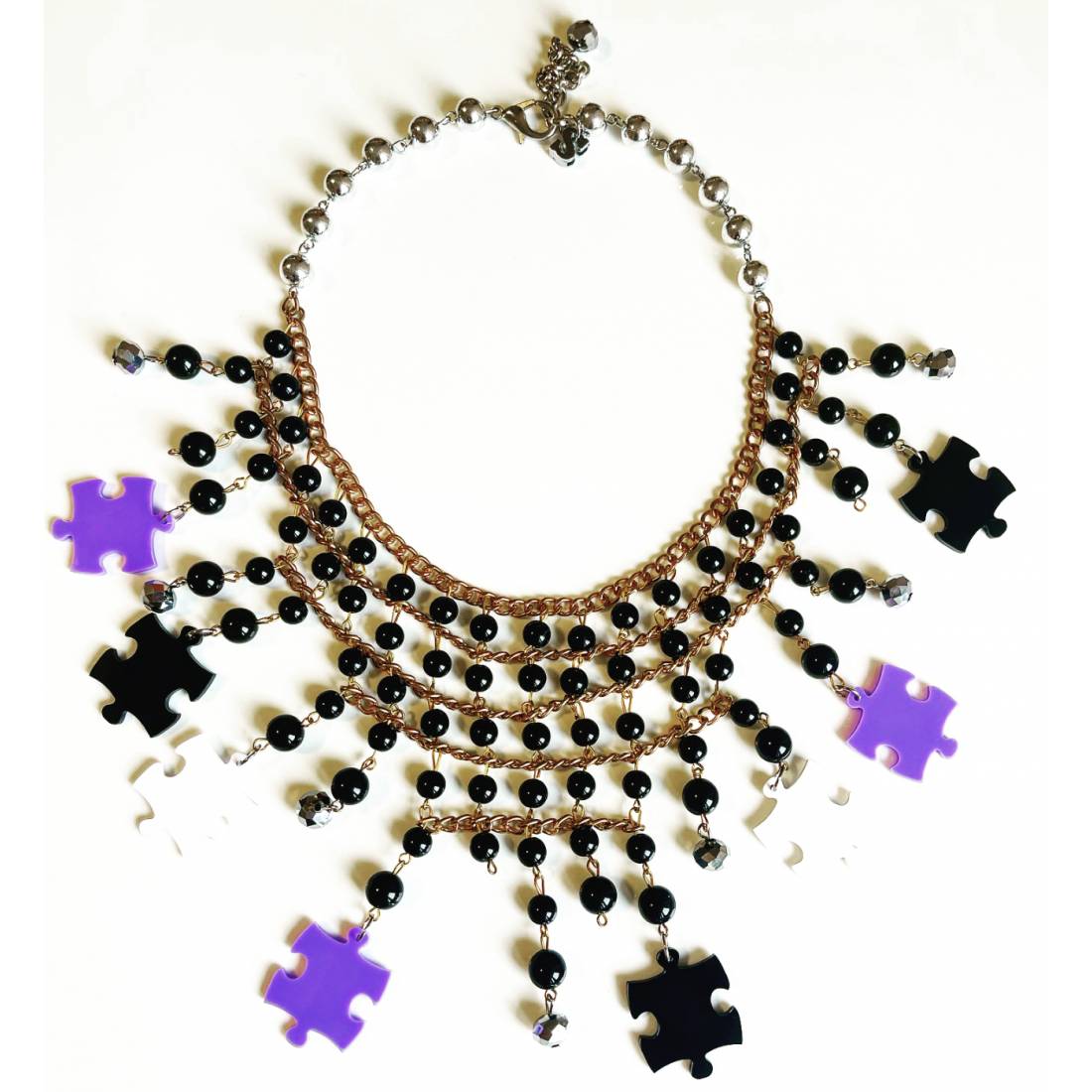 COLLANA PUZZLE NERO VIOLA BIANCO